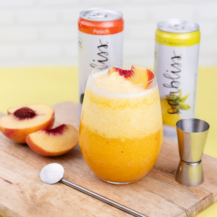 Layered Pineapple Peach Slush with Carbliss Vodka