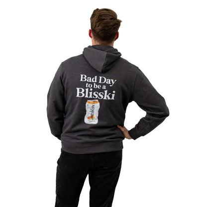 Person wearing a dark gray hoodie with 'Bad Day to be a Blisski' text and graphic on the back.