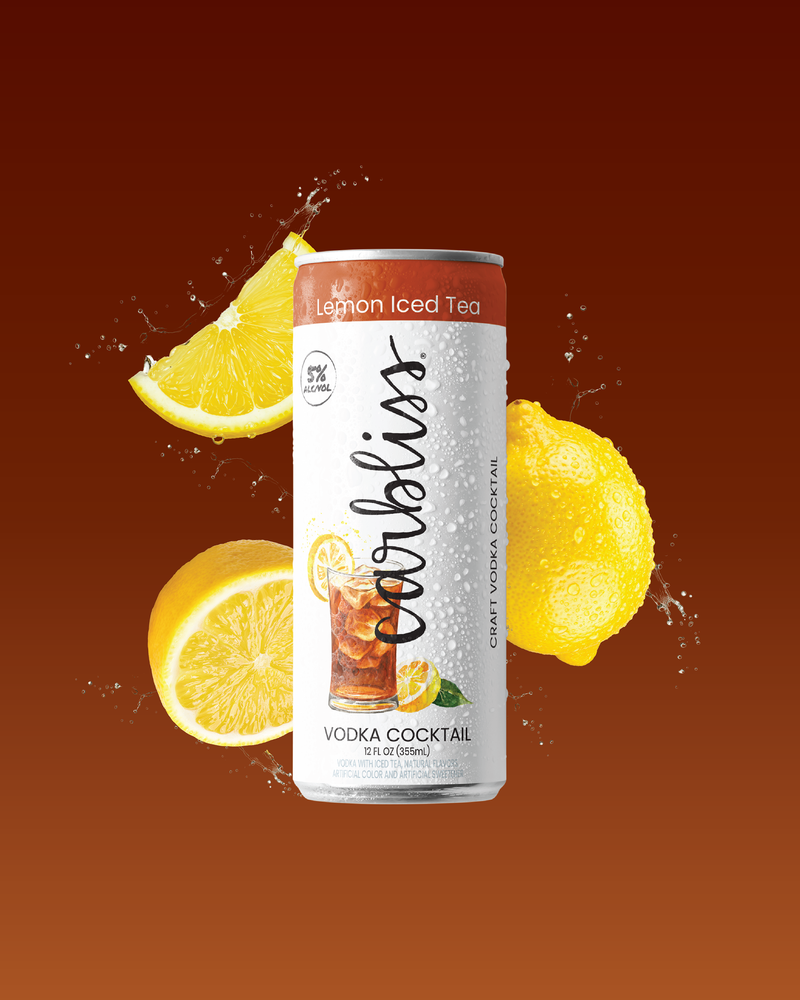Carbliss vodka cocktail can with lemon slices on a brown background